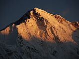 
The sun slowly descends the south face of Cho Oyu (8201m), the sixth highest mountain in the world, at sunrise from Gokyo, turning the colour of the face from a golden yellow to extremely bright white within a few minutes.
